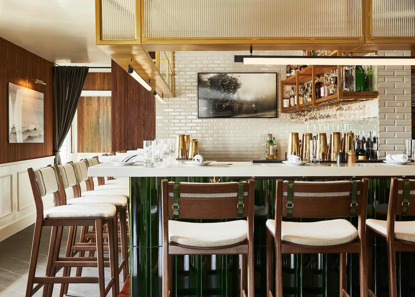 A restaurant bar with a full back-bar of spirits